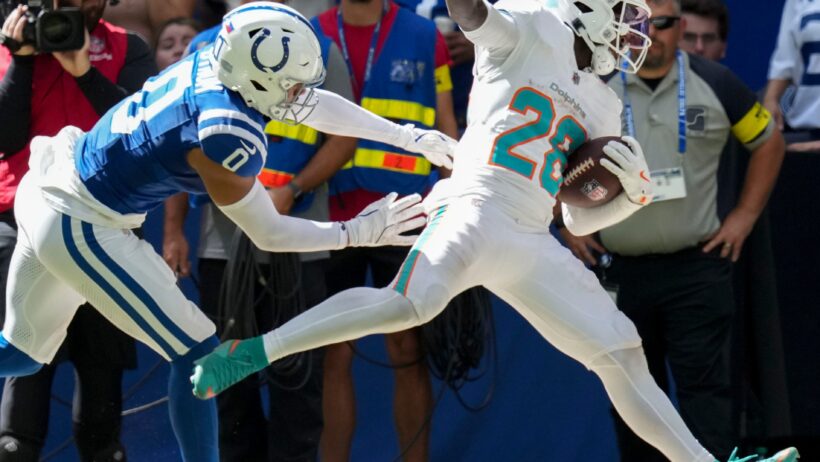 De'Von Achane runs is knocked out of bounds after a catch.