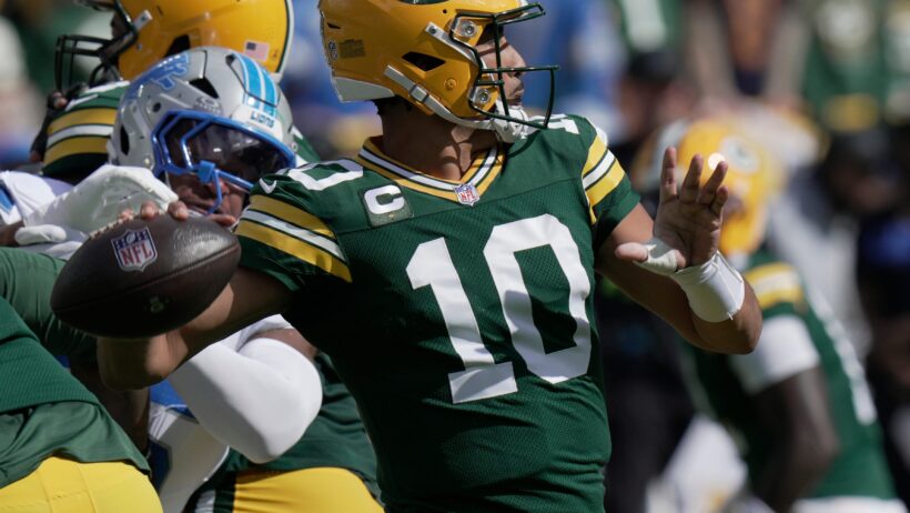 Green Bay Packers quarterback Jordan Love throwing a pass