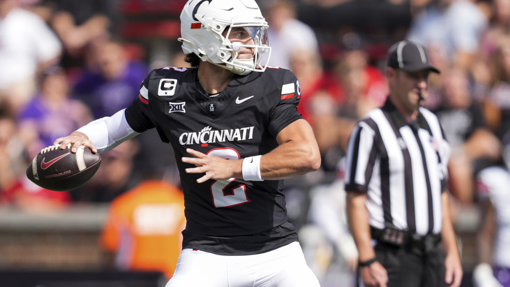 Cincinnati Bearcats quarterback Brendan Sorsby throws a pass