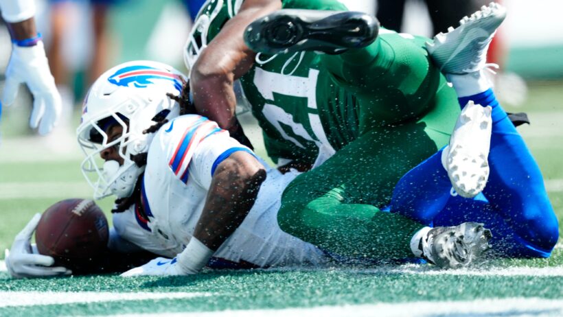 James Cook being tackled in the endzone