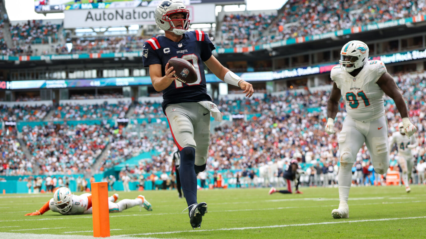 New England Patriots quarterback Drake Maye scoring a rushing TD