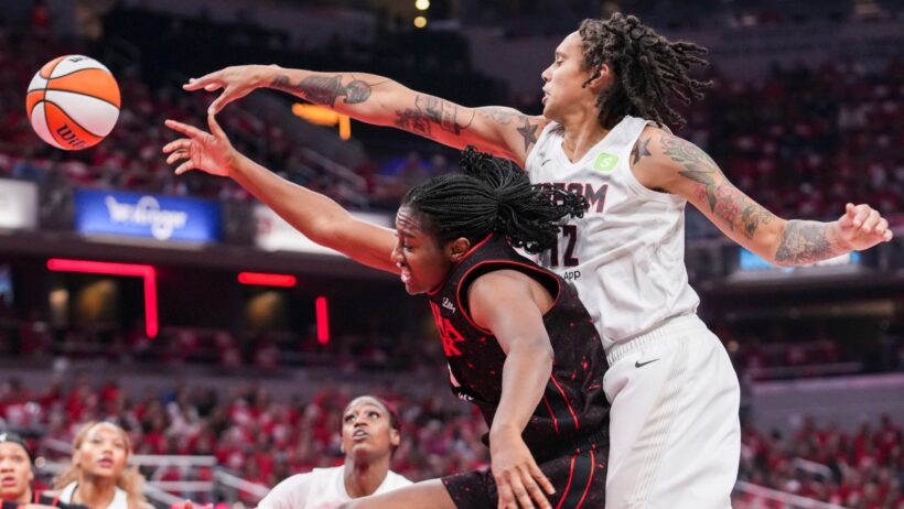 Indiana Fever forward Aliyah Boston and Atlanta Dream center Brittney Griner go after the ball