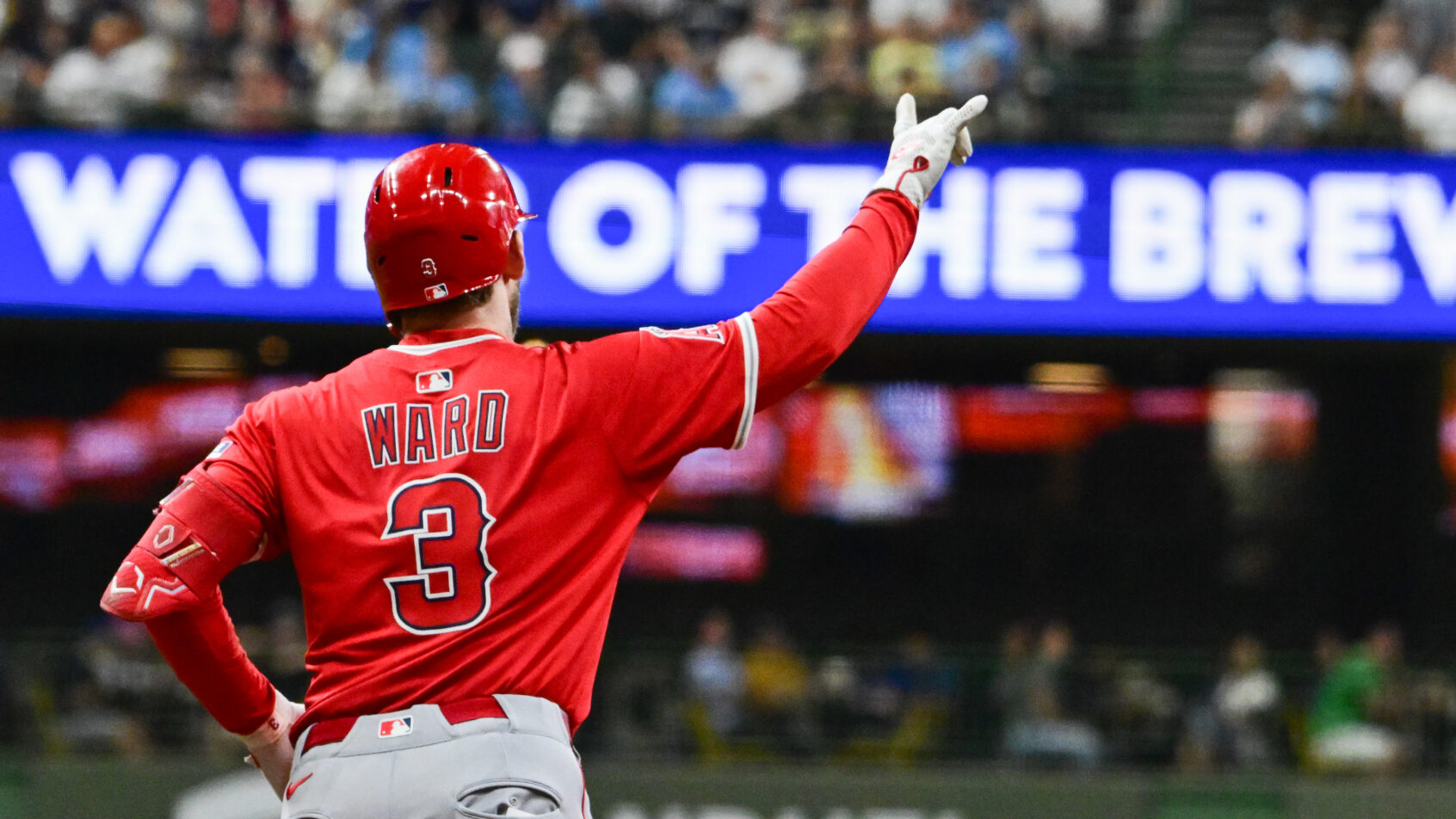 Taylor Ward rounding the bases after hitting a home run
