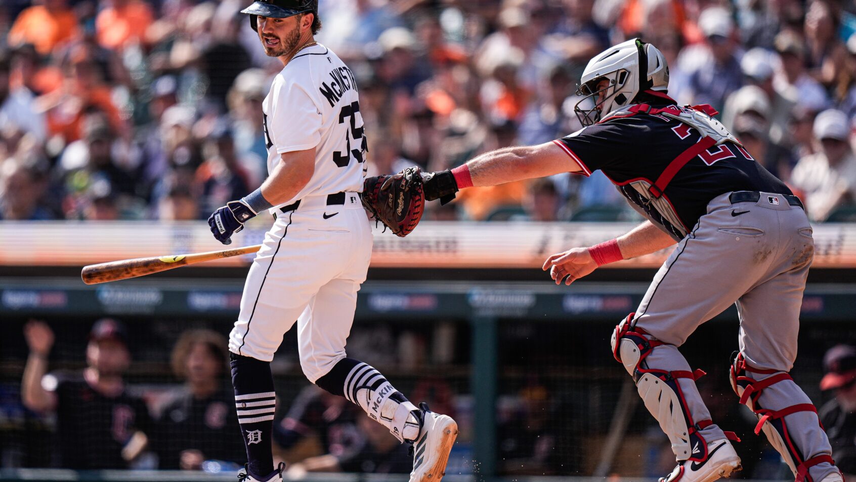 Detroit Tigers shortstop Zach McKinstry is tagged out after a foul tip against the Cleveland Guardians
