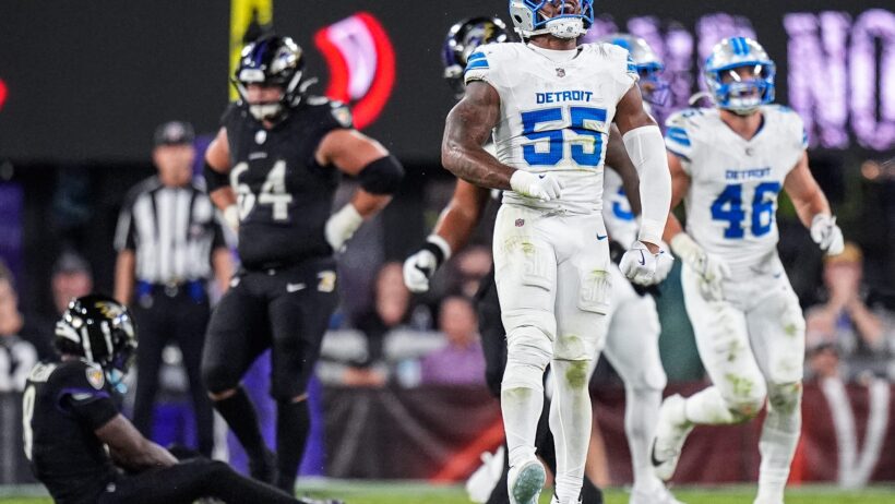 Detroit Lions linebacker Derrick Barnes celebrating after a sack