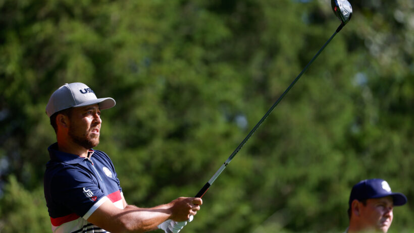 Team USA golfer Xander Schauffele looks at his tee shot