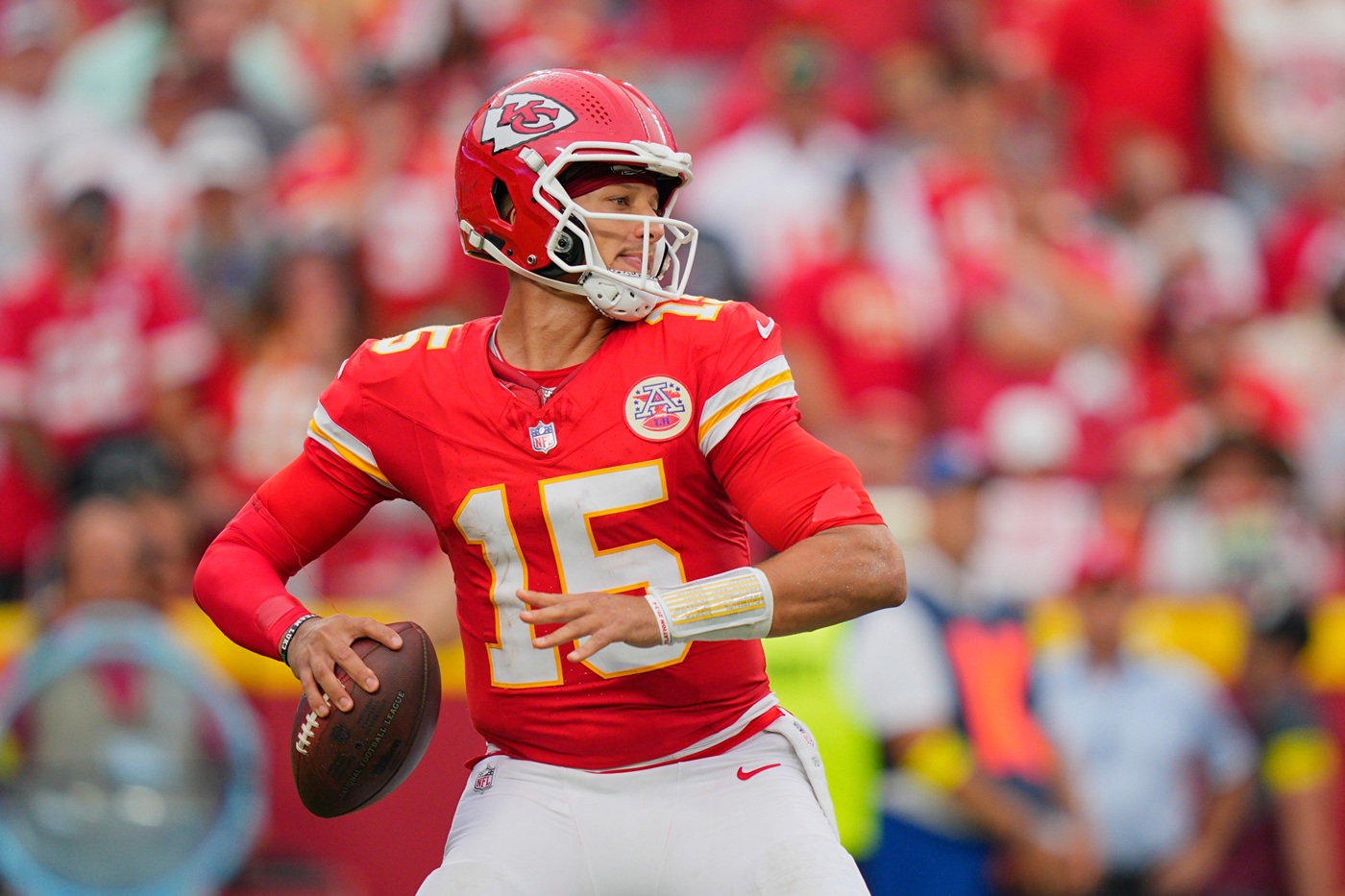 BET99 Promo code for NFL Week 3. Patrick Mahomes throwing pass.