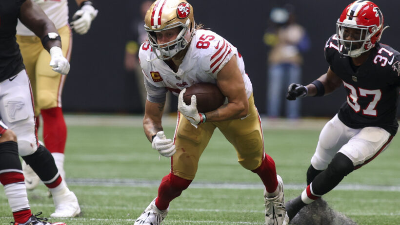 San Francisco 49ers tight end George Kittle running with the ball