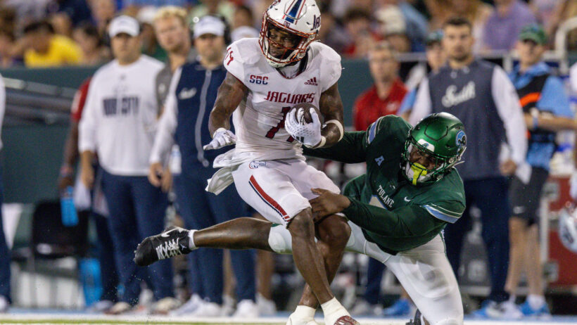 Kentrel Bullock trucks a defender.
