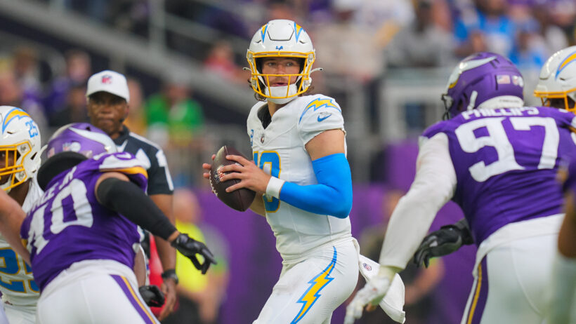 Los Angeles Chargers quarterback Justin Herbert holding the ball in the pocket