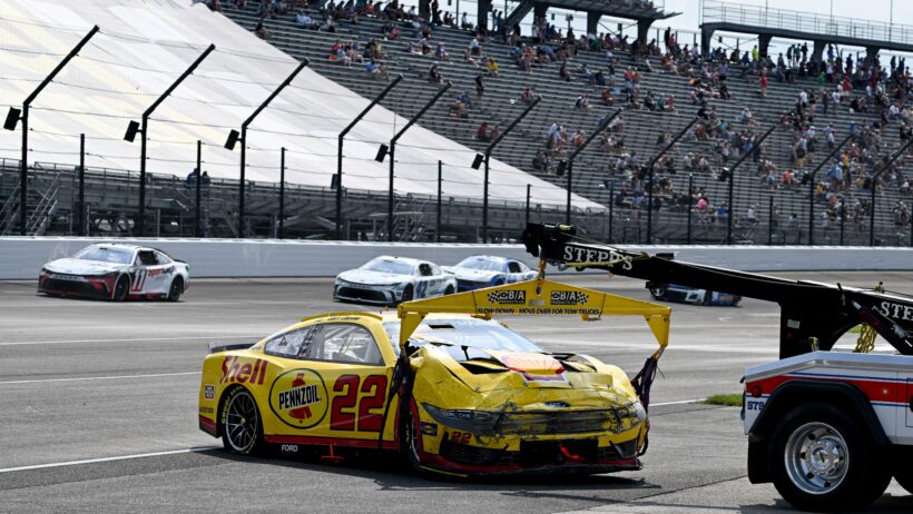 Joey Logano on a wrecker after crashing in Indianapolis (2025).