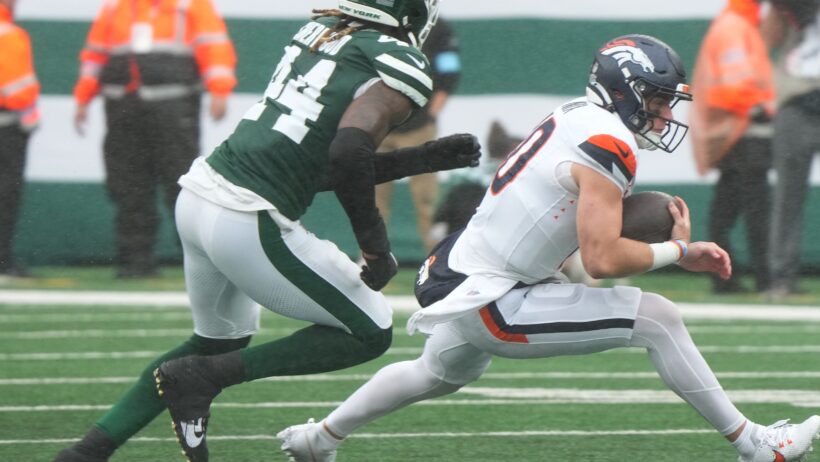 Jamien Sherwood of the New York Jets chases Bo Nix of the Denver Broncos