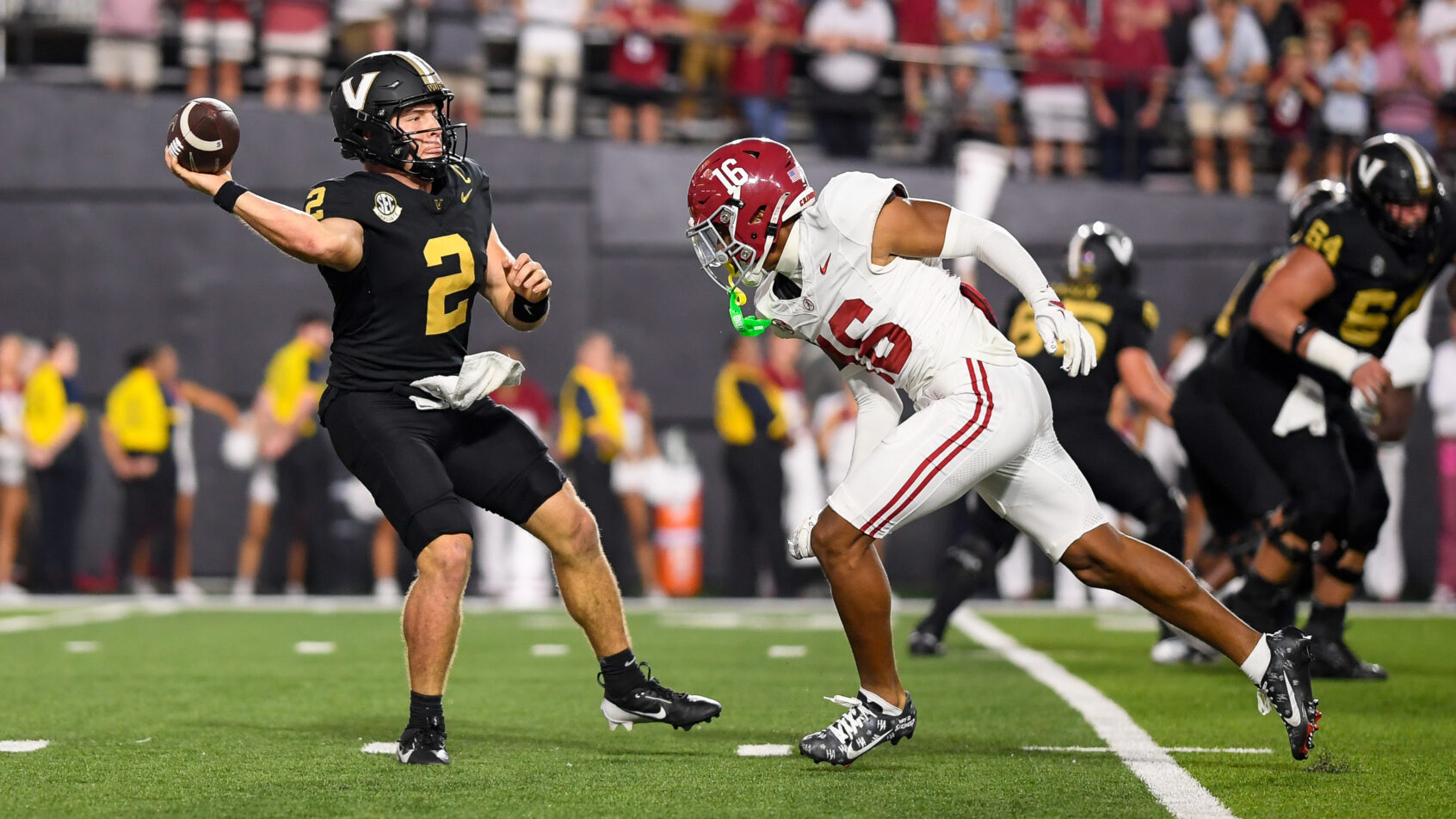 Vanderbilt Commodores quarterback Diego Pavia (2) throws the ball against Alabama Crimson Tide defensive back Red Morgan