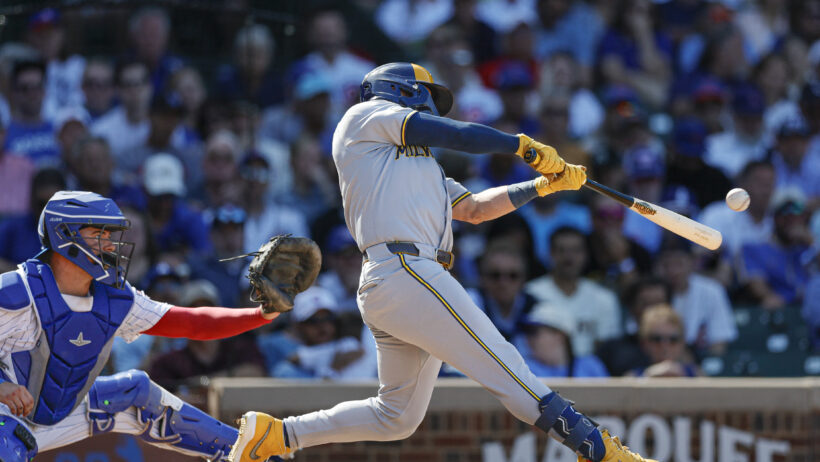 Milwaukee Brewers left fielder Isaac Collins at the plate against the Chicago Cubs