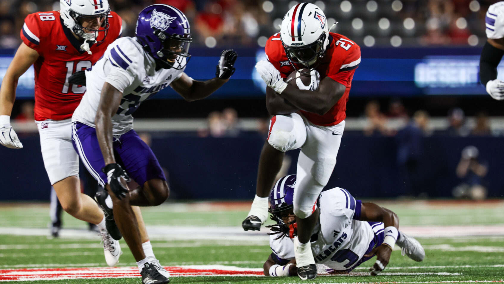 Ismail Mahdi carries the ball versus Weber State.