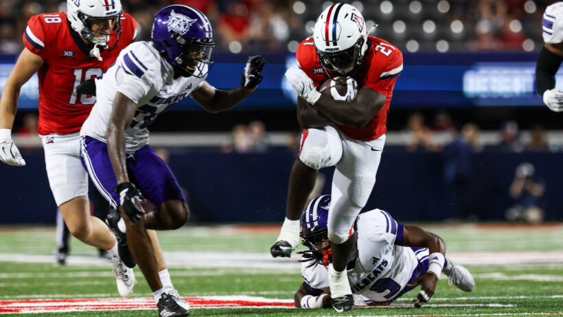 Ismail Mahdi carries the ball versus Weber State.