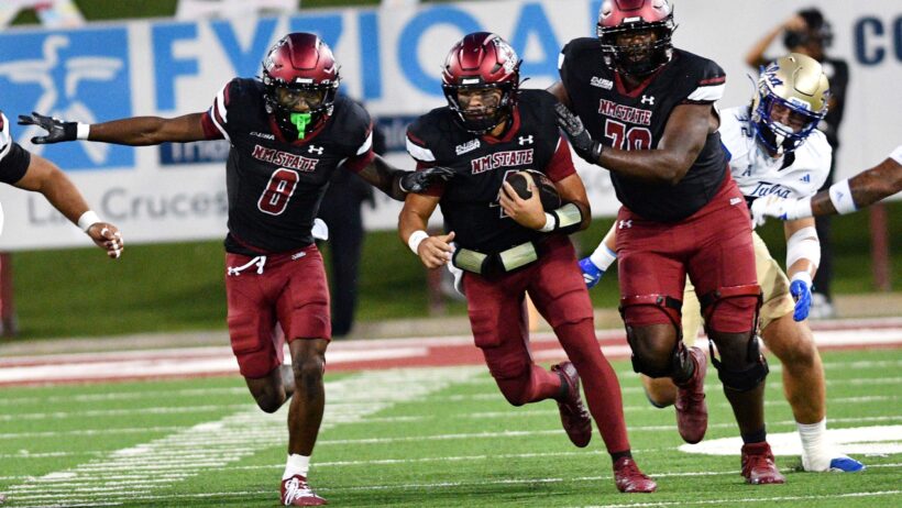 Logan Fife running with ball