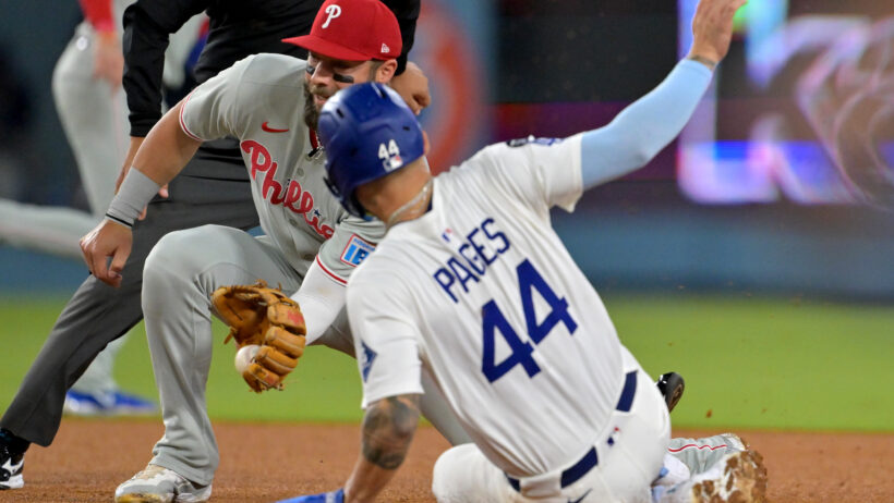 Los Angeles Dodgers center fielder Andy Pages slides into second base