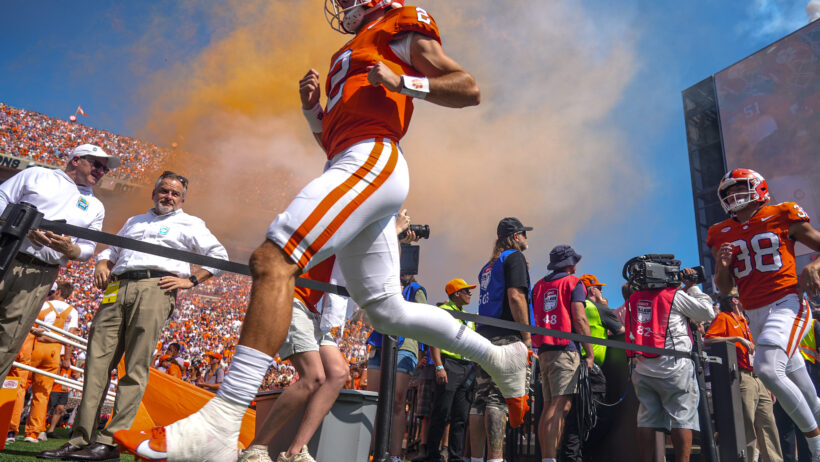 Cade Klubnik leads the Clemson Tigers out onto the field.