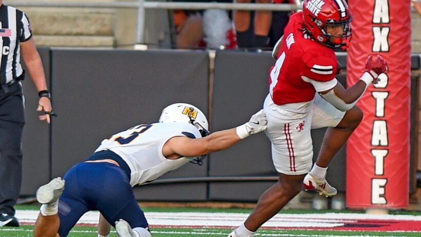 Cam Cook breaking tackle