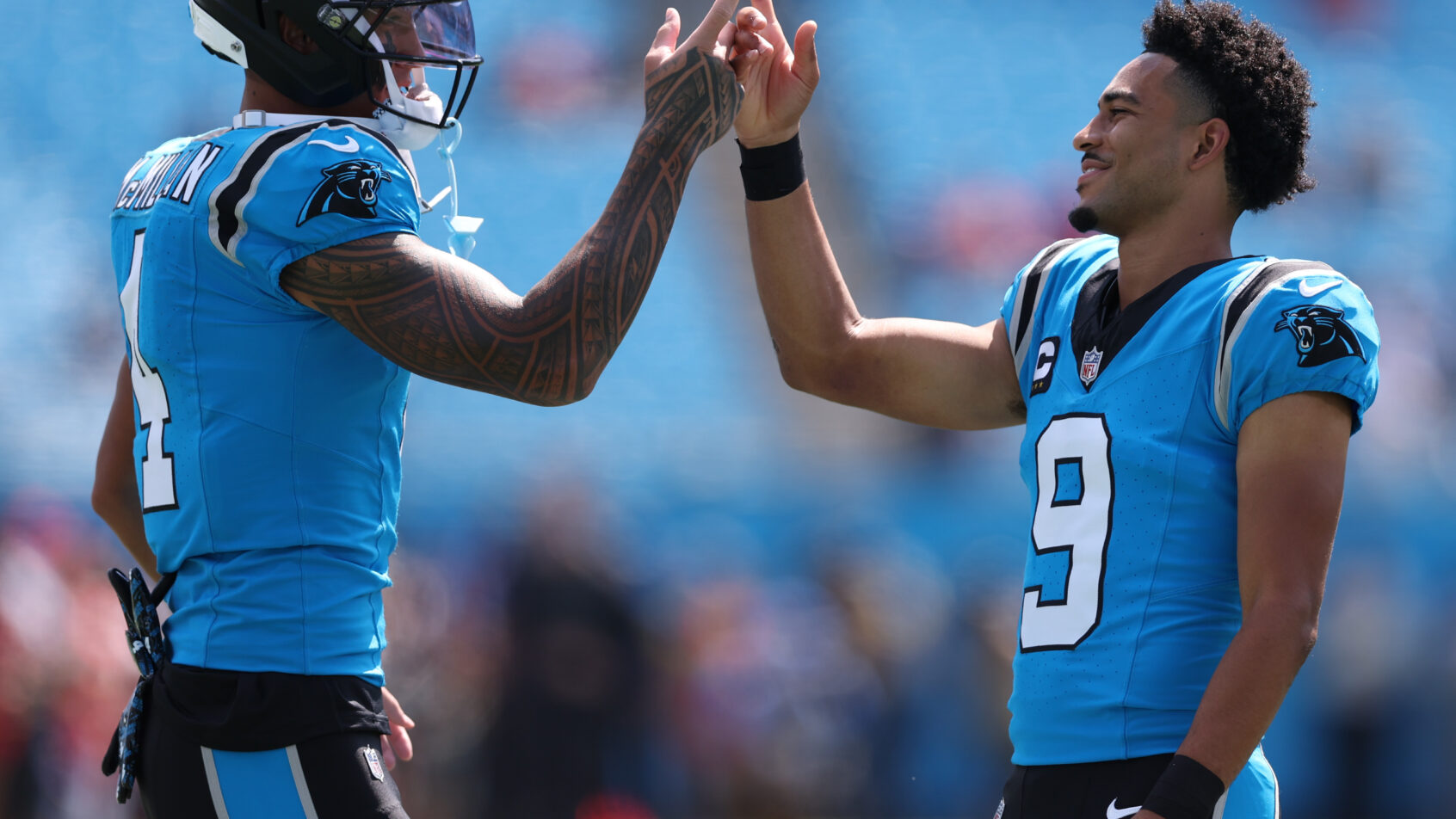 Tetairoa McMillan and Bryce Young pregame