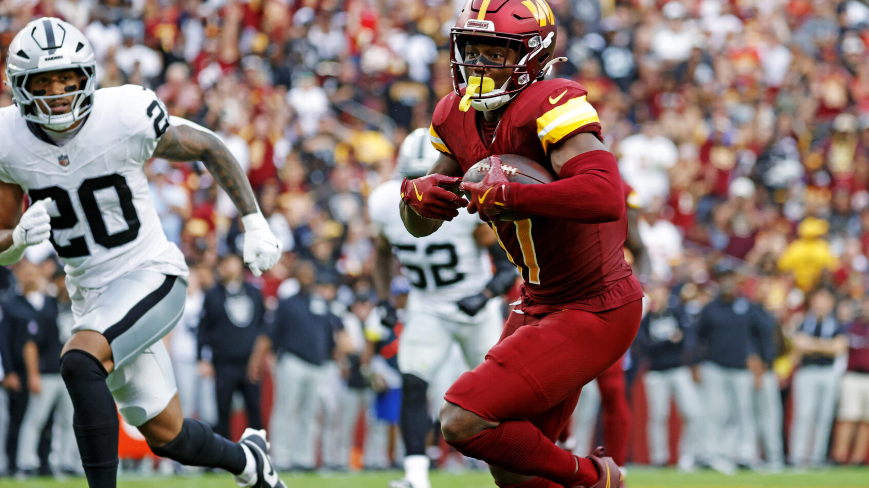 Washington Commanders wide receiver Terry McLaurin running with the ball