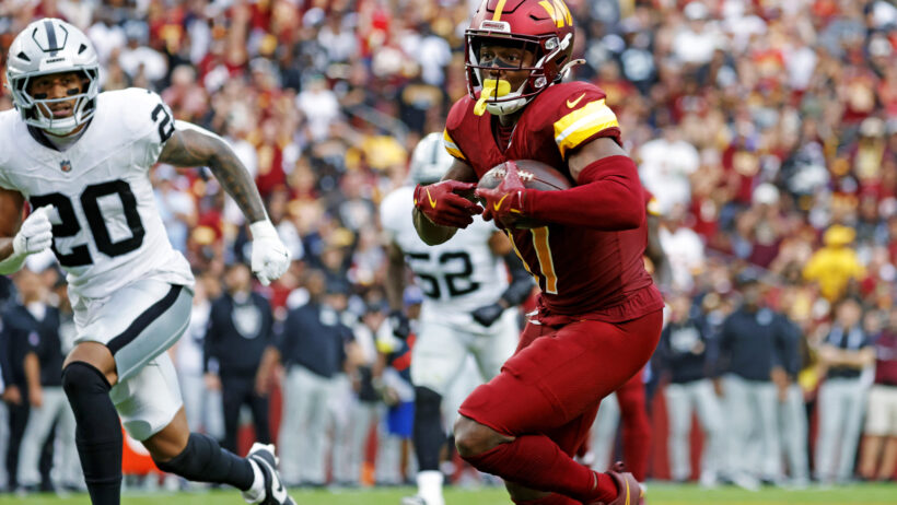 Washington Commanders wide receiver Terry McLaurin running with the ball