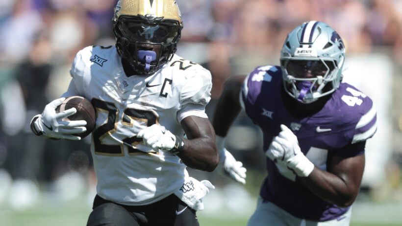 Myles Montgomery runs the ball versus Kansas State.