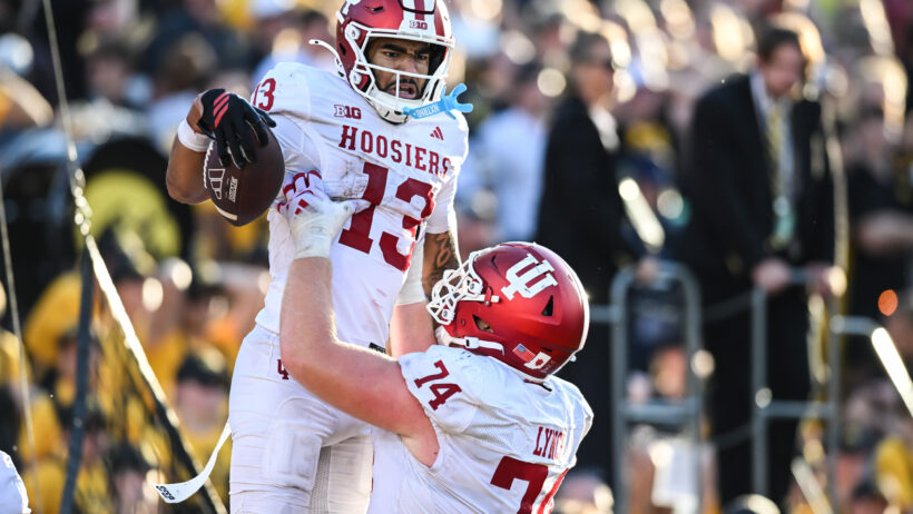 Indiana Hoosiers celebrate a touchdown versus Iowa Hawkeyes.