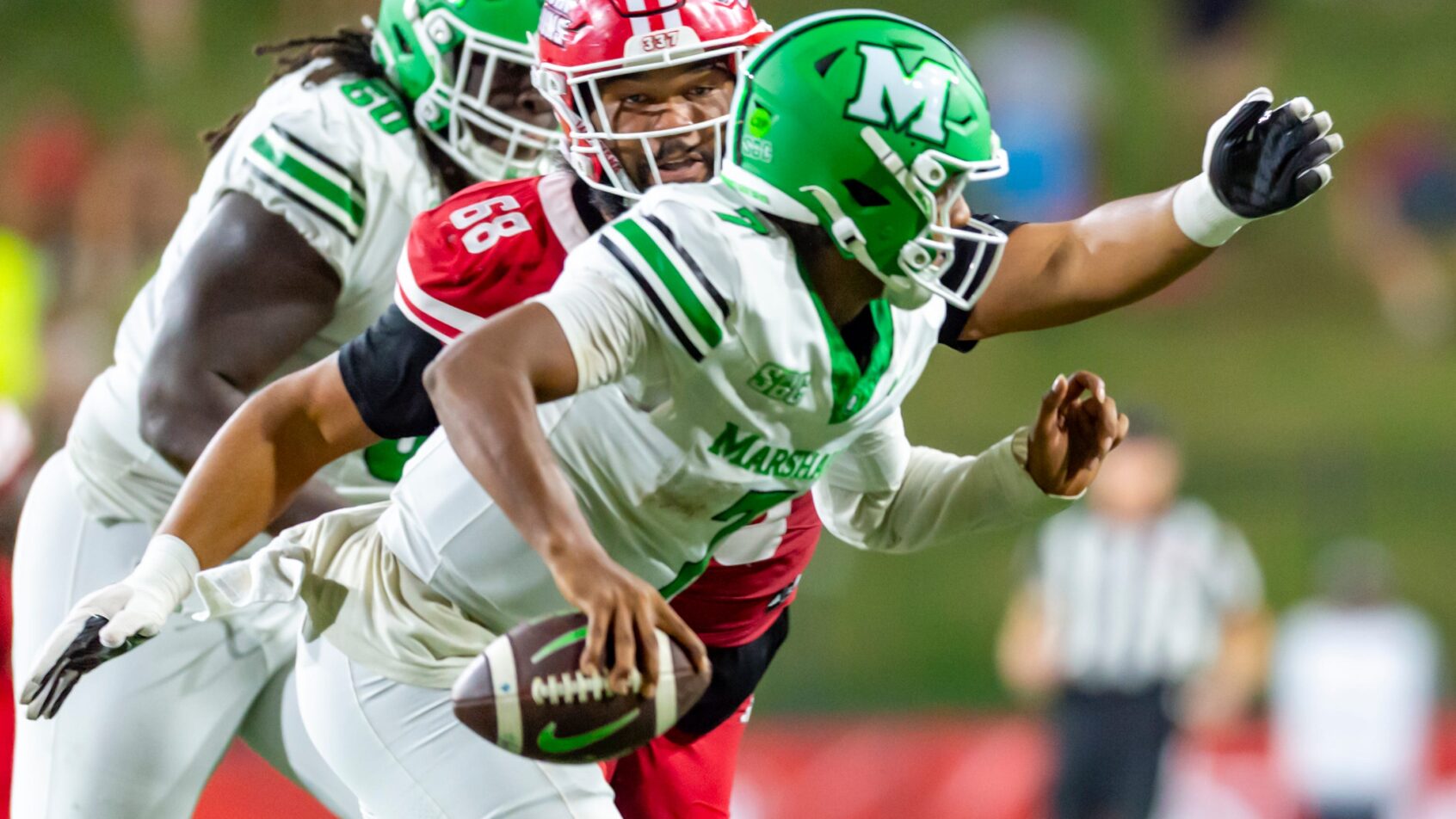 Carlos Del Rio-Wilson leads Marshall down the field.