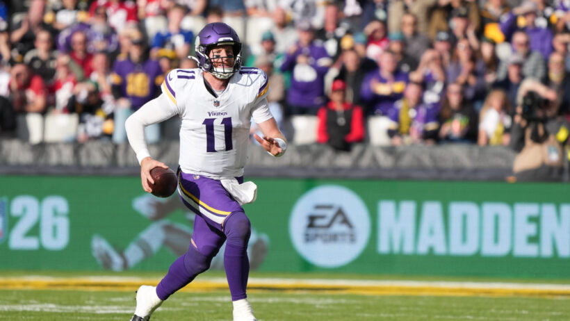 Minnesota Vikings quarterback Carson Wentz running with the ball