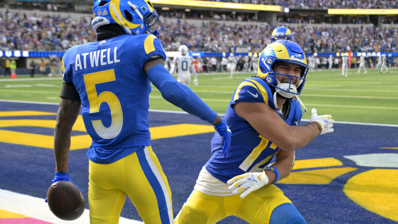 Puka Nacua and Tutu Atwell celebrate a Rams touchdown.