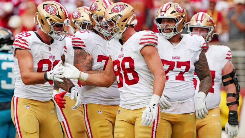 Jake Tonges and the 49ers celebrating after a touchdown