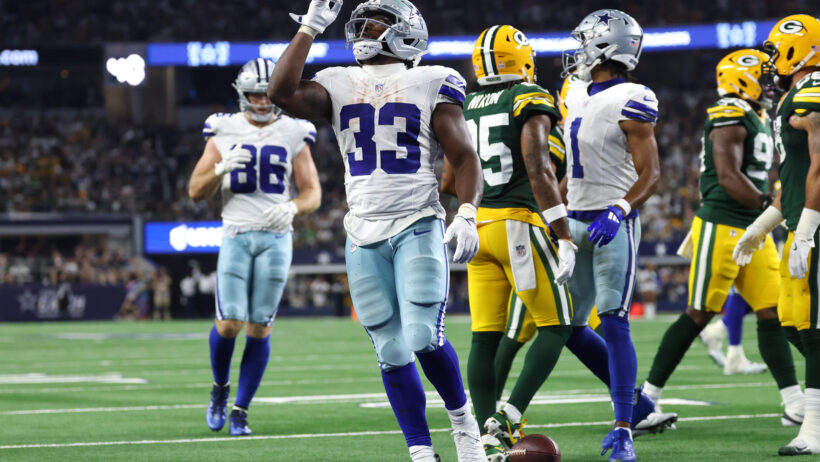 Javonte Williams celebrating after scoring a touchdown