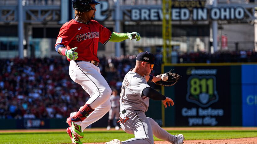 Detroit Tigers first baseman Spencer Torkelson committing an error as Cleveland Guardians third baseman José Ramírez touches the bag