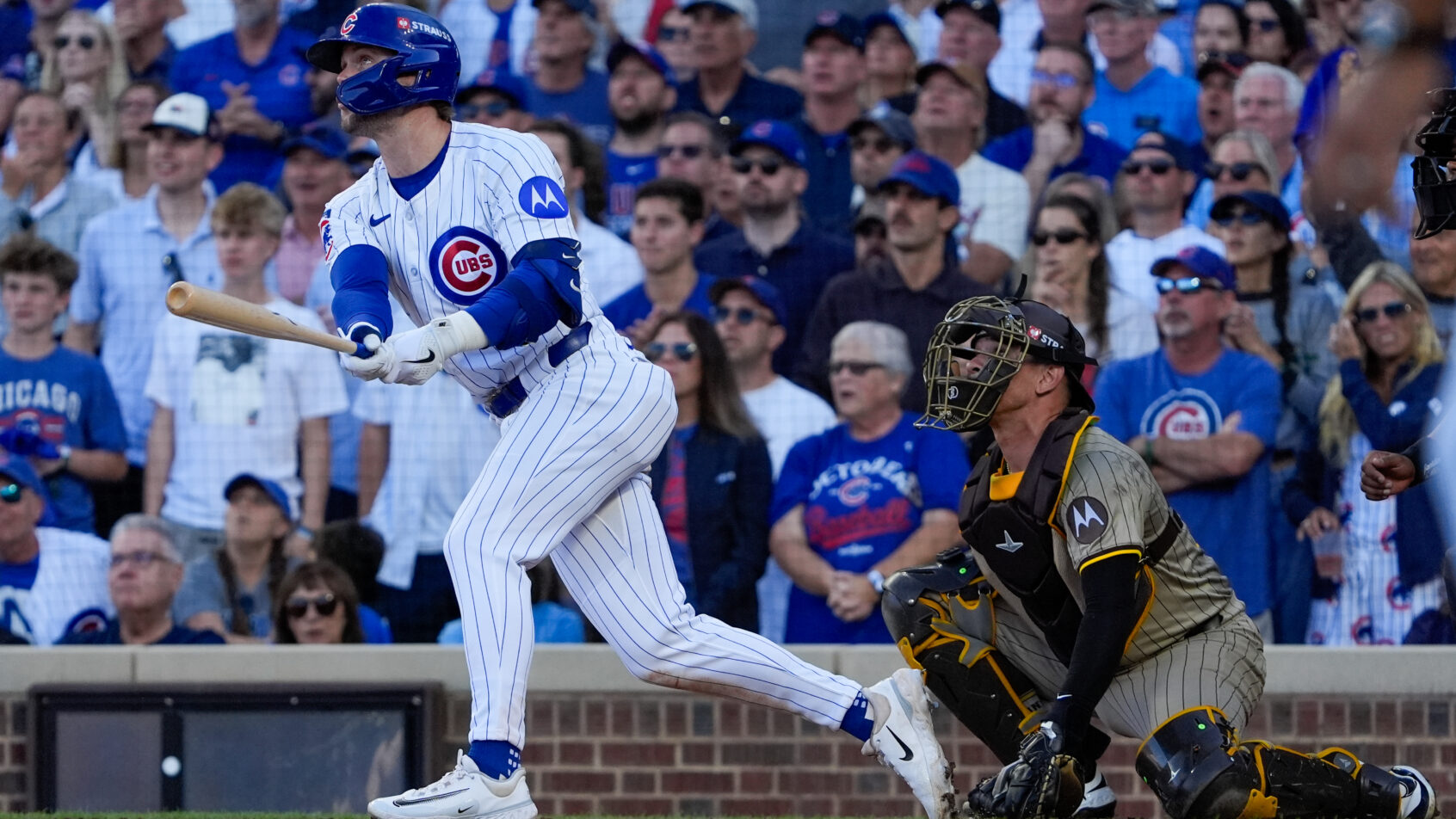 Chicago Cubs infielder Nico Hoerner hits a single against the San Diego Padres