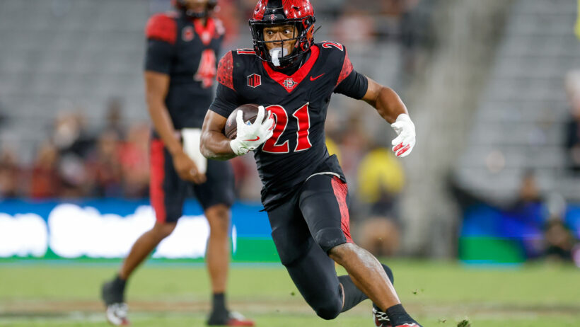 Lucky Sutton runs the ball for San Diego State.