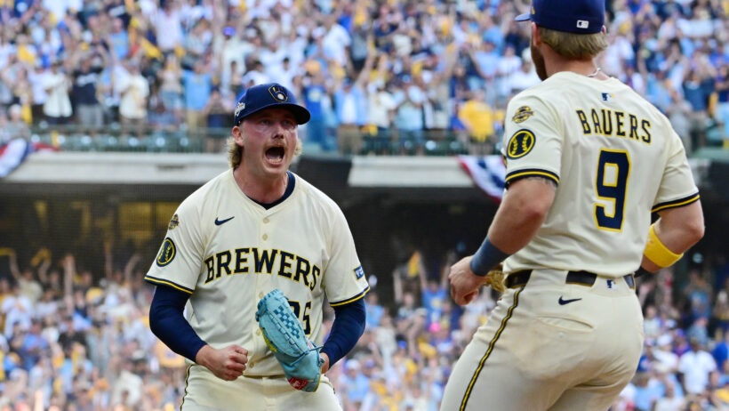 Milwaukee Brewers pitcher Nick Mears celebrates with left fielder Jake Bauers after a win