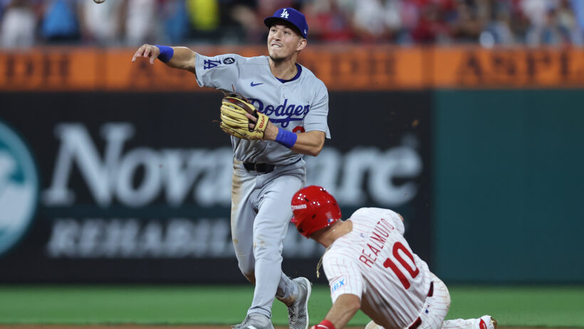 Los Angeles Dodgers second baseman Tommy Edman turning a double-play