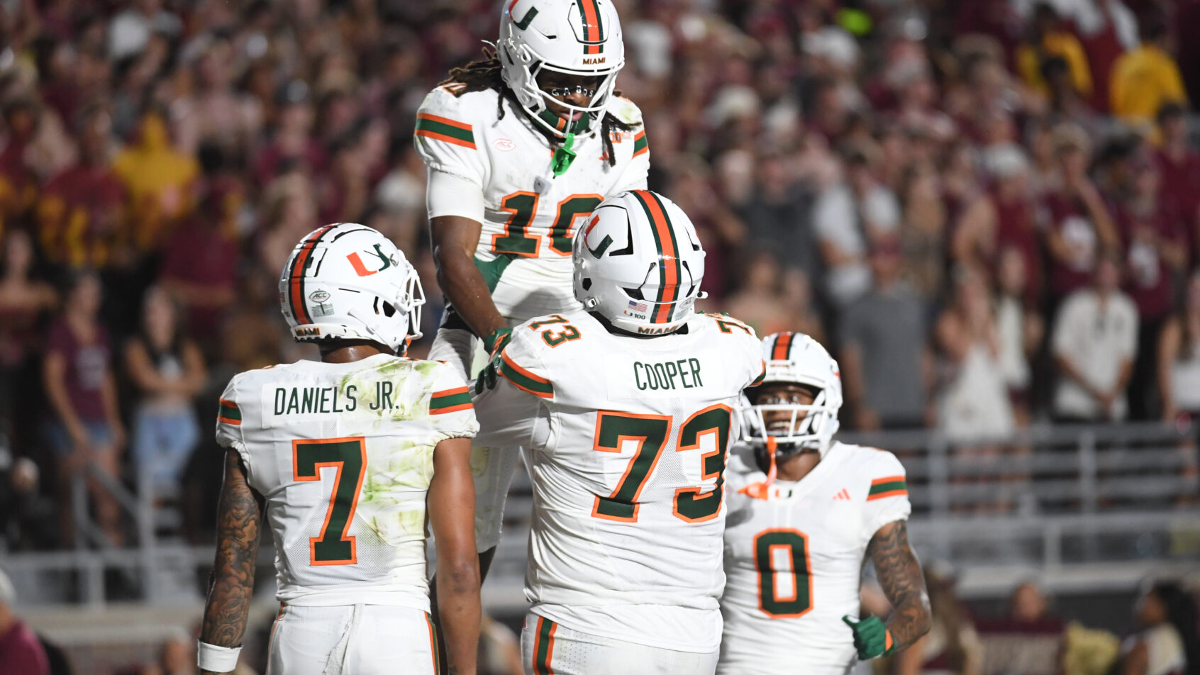 Miami Hurricanes celebrate a touchdown versus Florida State.