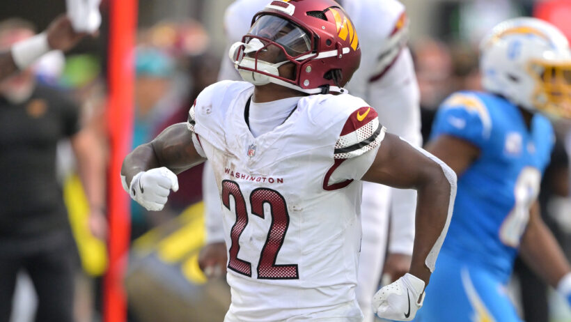 Jacory Croskey-Merritt celebrates a run versus the Chargers.