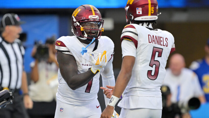 Deebo Samuel and Jayden Daniels celebrate after a touchdown