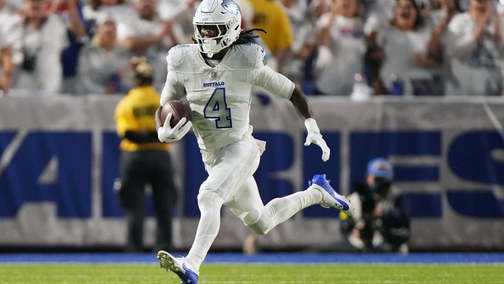 Buffalo Bills running back James Cook carrying the ball