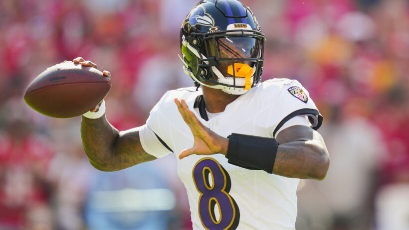 Baltimore Ravens quarterback Lamar Jackson throwing a pass