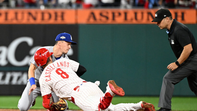 Philadelphia Phillies right fielder Nick Castellanos slides into second base