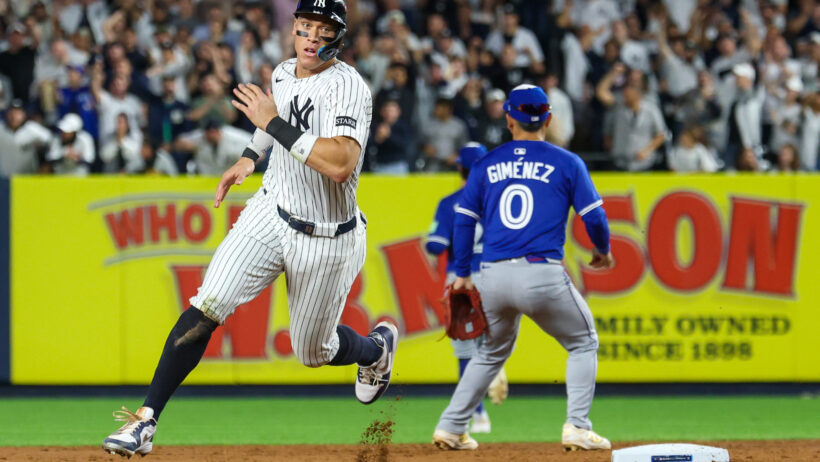 New York Yankees outfielder Aaron Judge rounding second base
