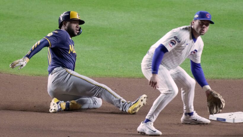 Milwaukee Brewers center fielder Jackson Chourio sliding into second base against the Chicago Cubs