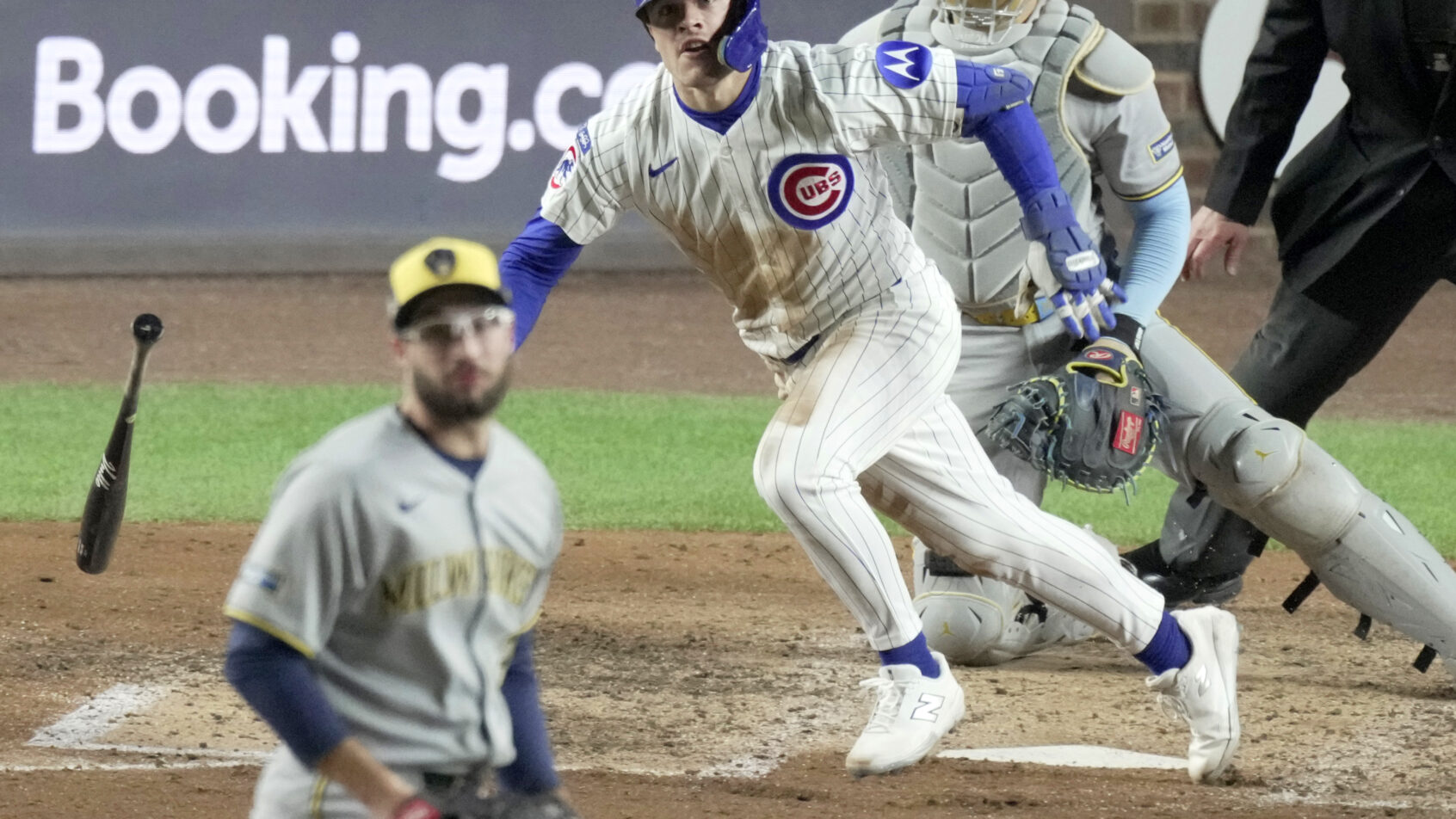 Chicago Cubs third baseman Matt Shaw hitting a single against the Milwaukee Brewers