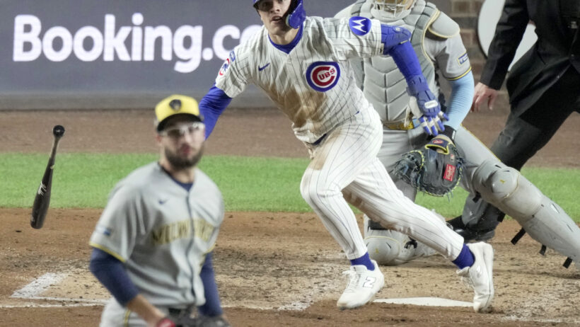 Chicago Cubs third baseman Matt Shaw hitting a single against the Milwaukee Brewers