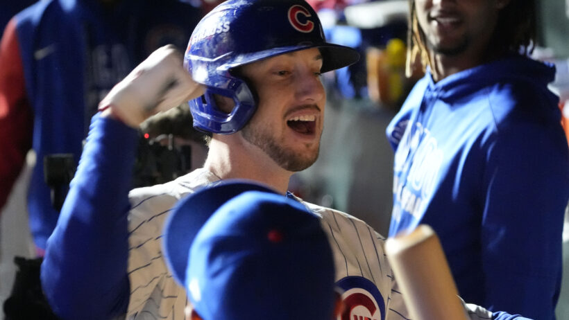 Chicago Cubs right fielder Kyle Tucker celebrates a home run in the dugout